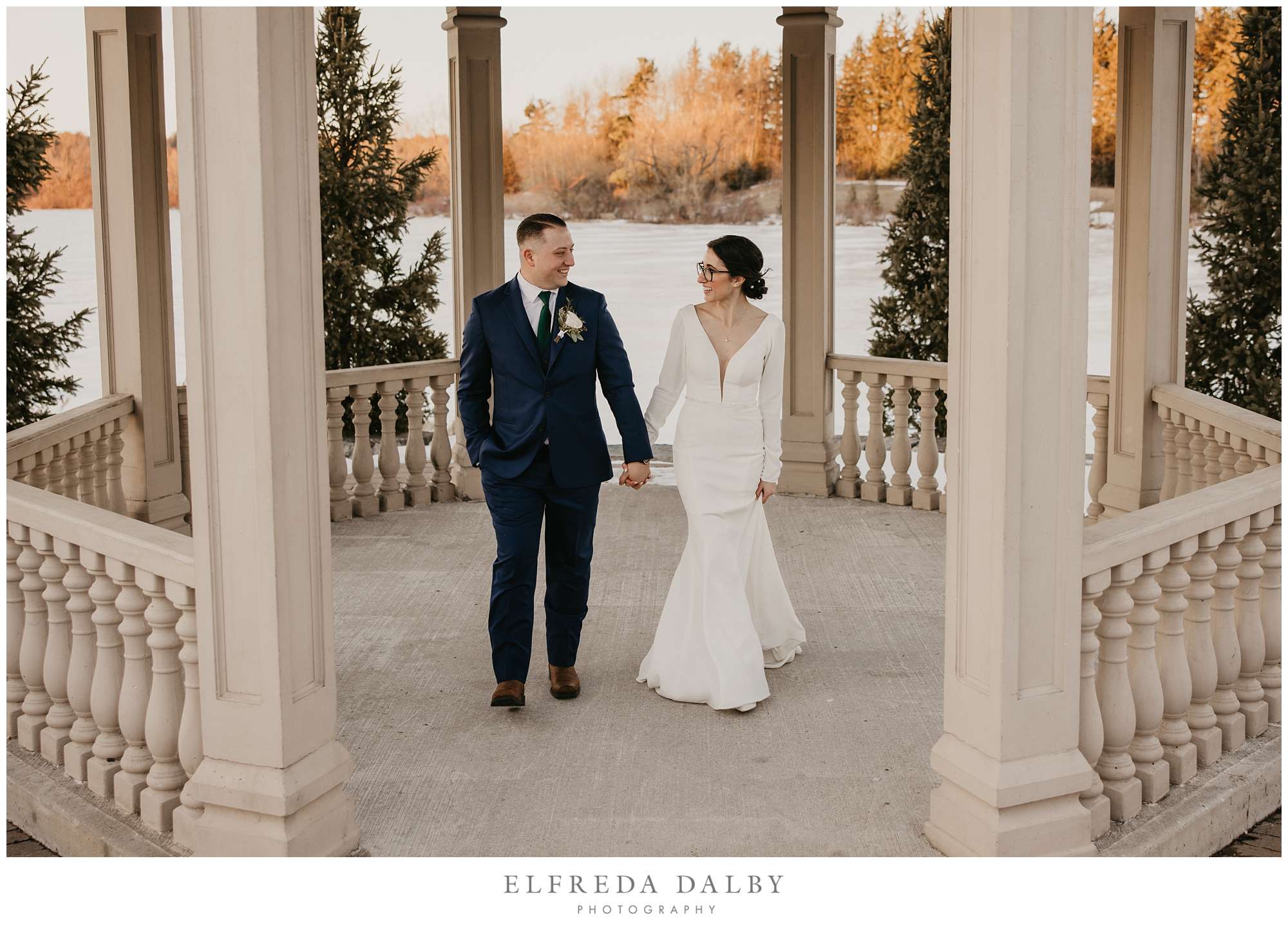 Wedding couple standing in the gazebo at the Royal Ambassador Banquet